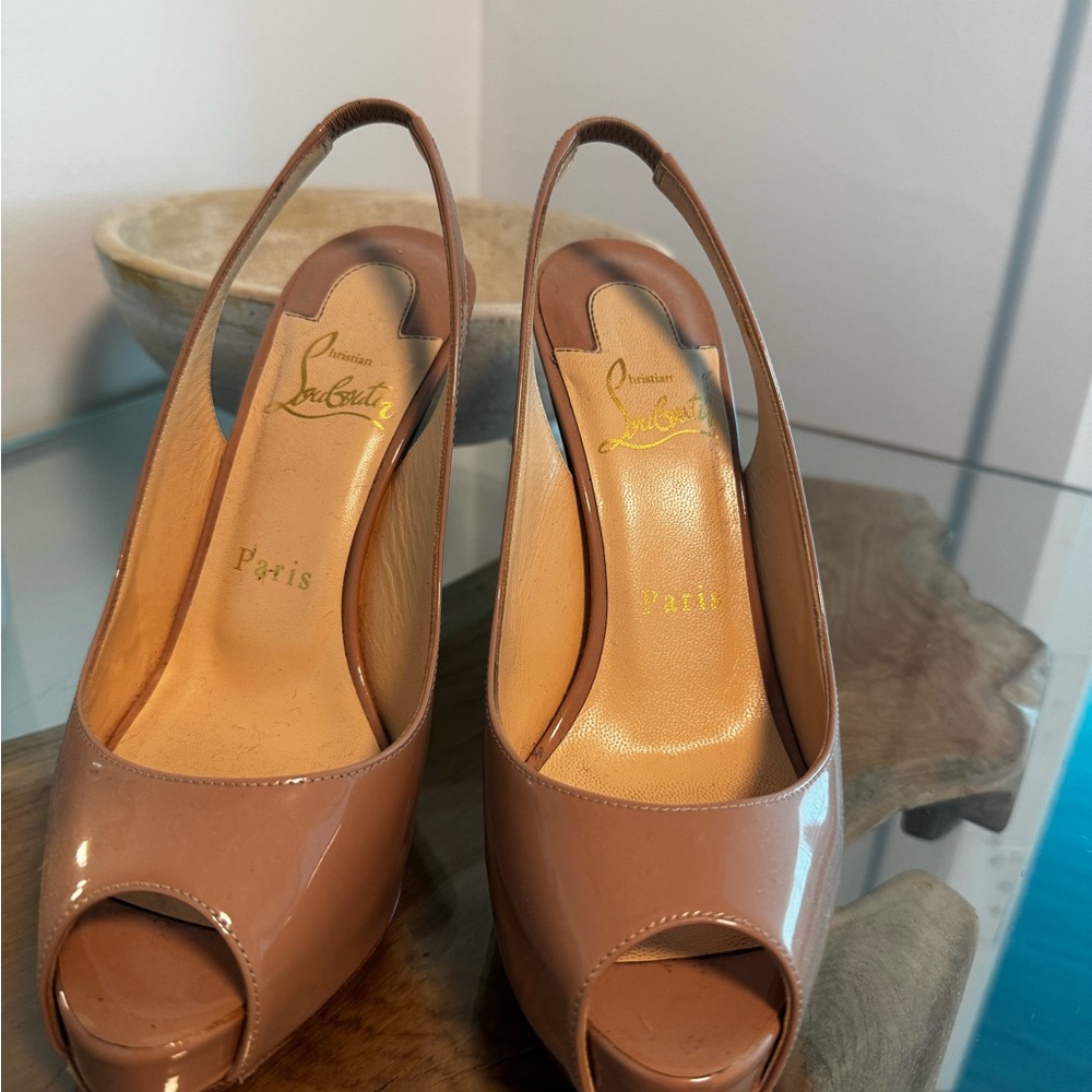 Christian Louboutin Christian Louboutin
"Private Number"
Nude Slingback size